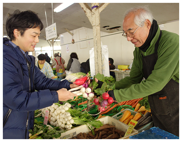 野菜を渡す